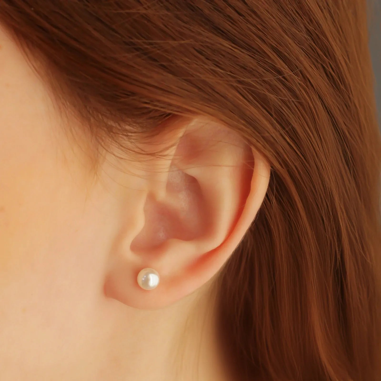 BRINCO PÉROLA BANHADO A OURO 18K - M