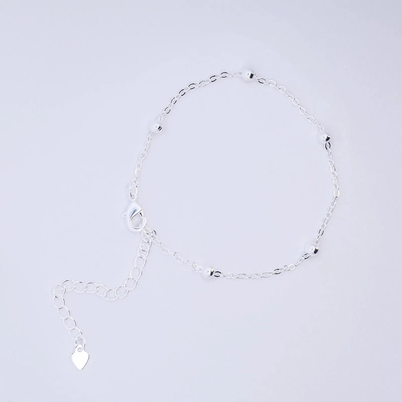 PULSEIRA BOLINHAS BANHADA A PRATA