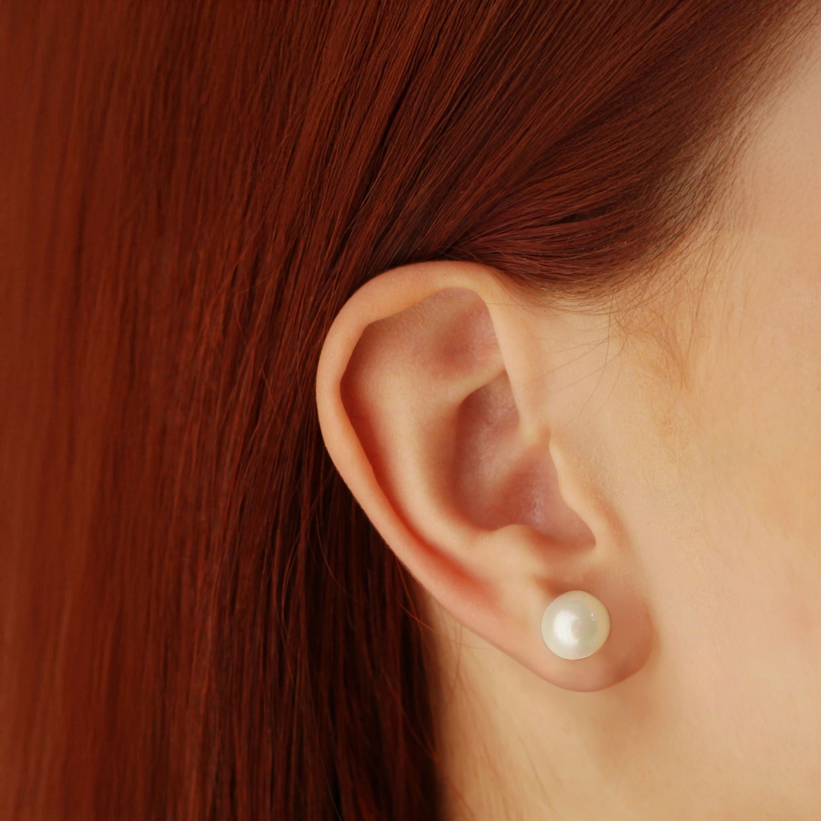 BRINCO PÉROLA BANHADO A OURO 18K - GG