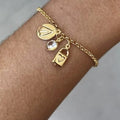 PULSEIRA NOSSA SENHORA E PONTO LUZ BANHADA A OURO 18K