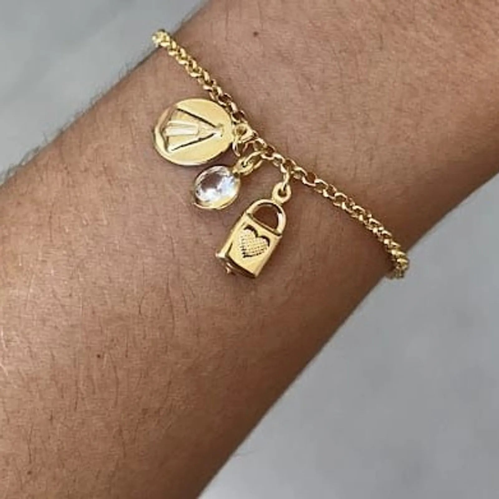 PULSEIRA NOSSA SENHORA E PONTO LUZ BANHADA A OURO 18K