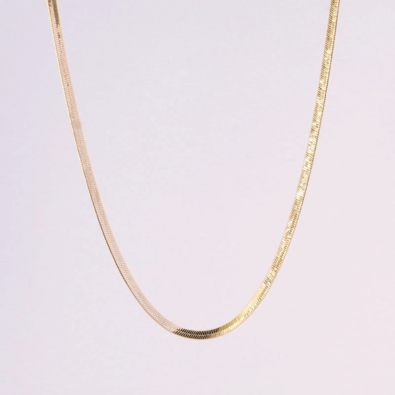 CHOKER FITA 2MM BANHADA A OURO 18K