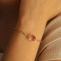 PULSEIRA ELOS CARTIER PEDRA OVAL ROSA BANHADA A OURO 18K