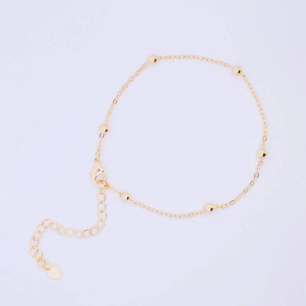 PULSEIRA BOLINHAS BANHADA A OURO 18K