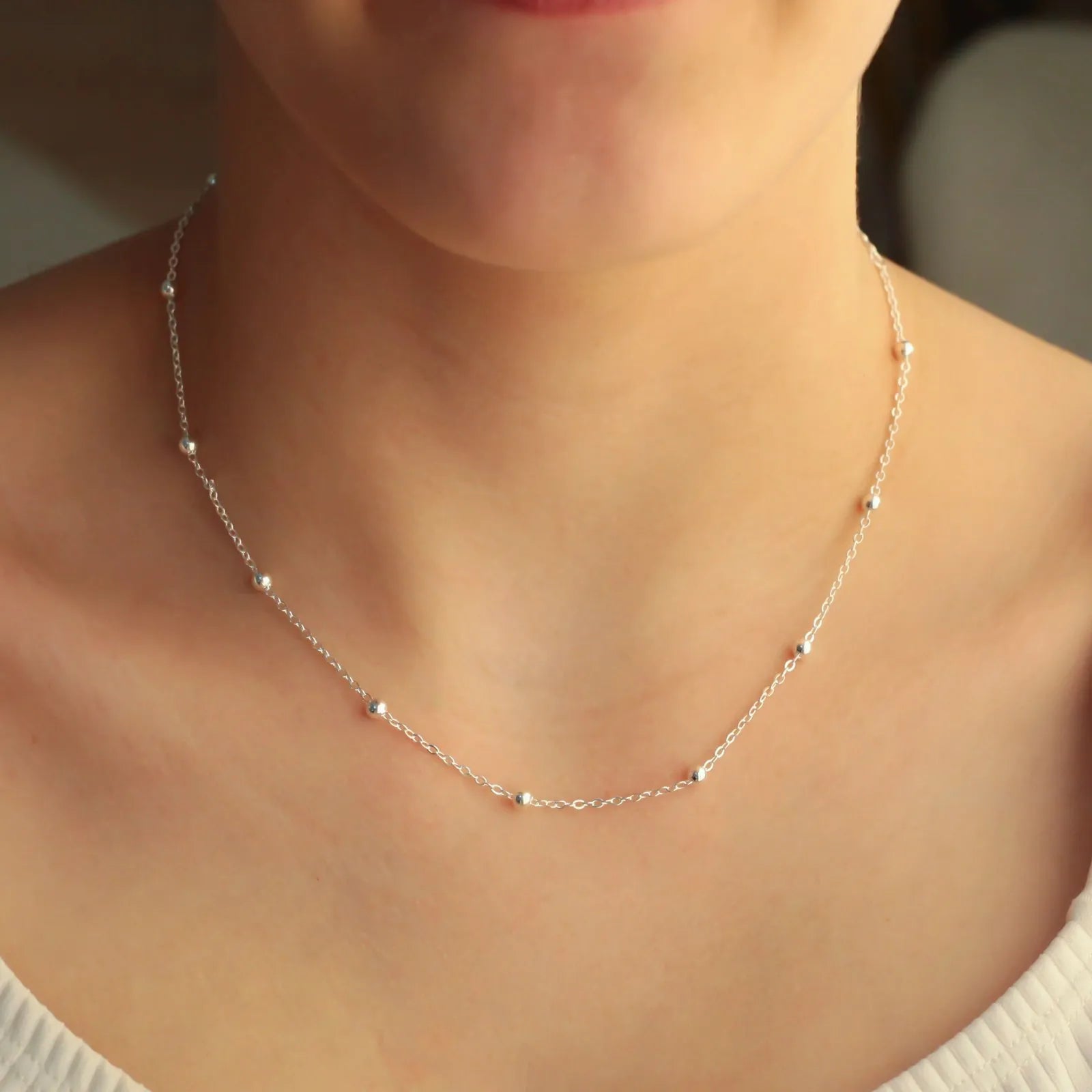 CHOKER BOLINHA BANHADA A PRATA