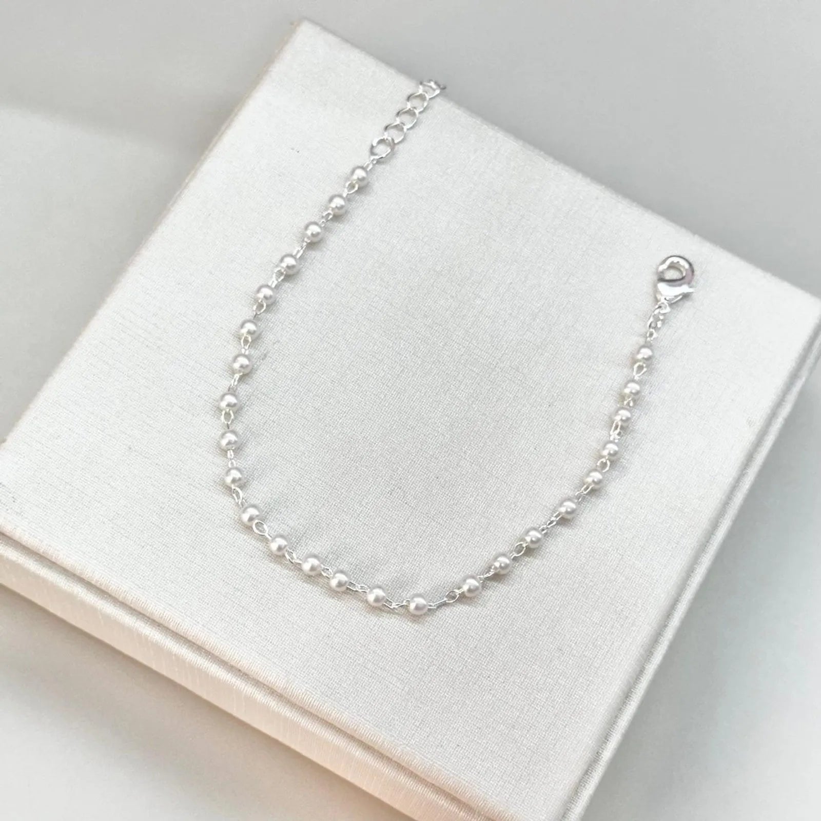 PULSEIRA PÉROLAS MINI BANHADA A PRATA