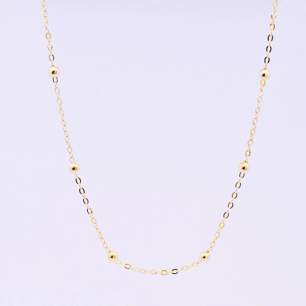 COLAR LONGO BOLINHAS BANHADO A OURO 18K