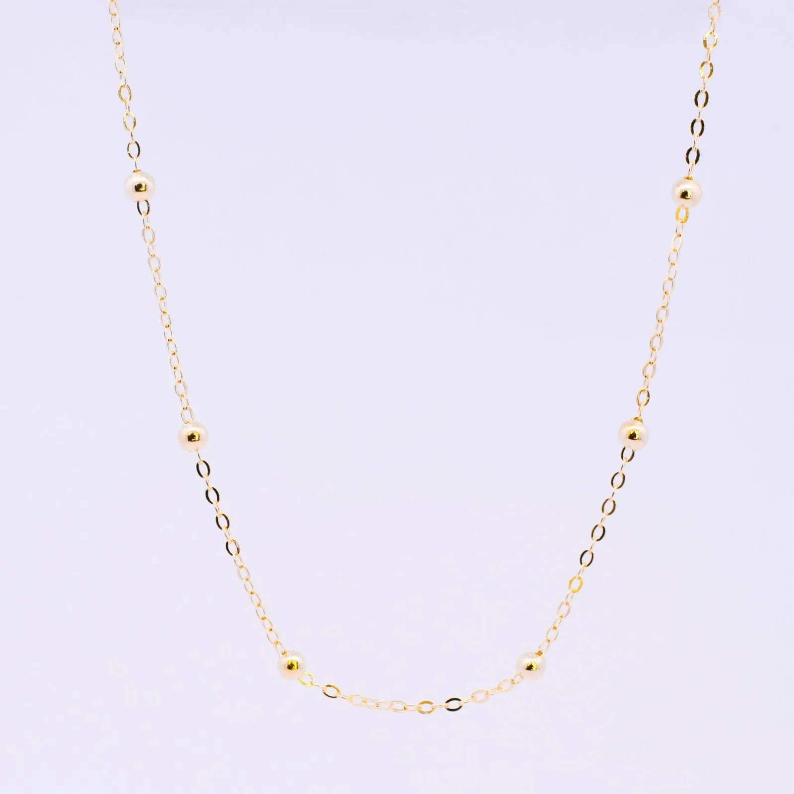 COLAR LONGO BOLINHAS BANHADO A OURO 18K